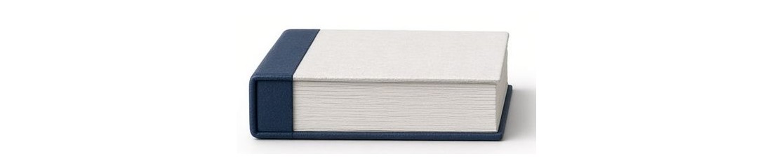 A closed book with a navy spine.